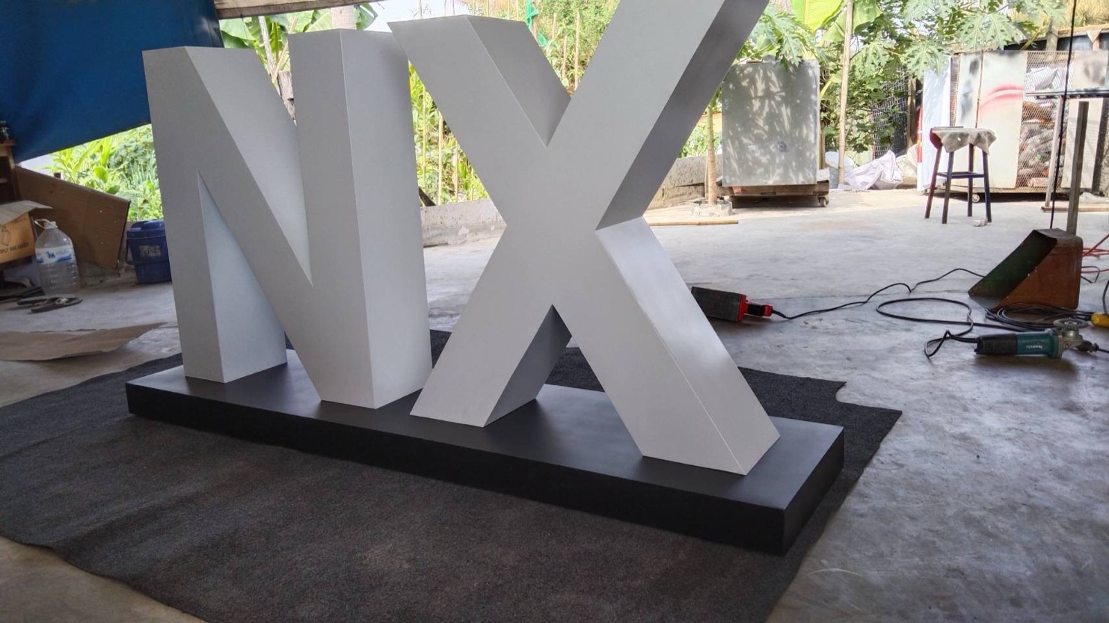 NX freestanding 3D built-up letters in the Mommy Signage workshop